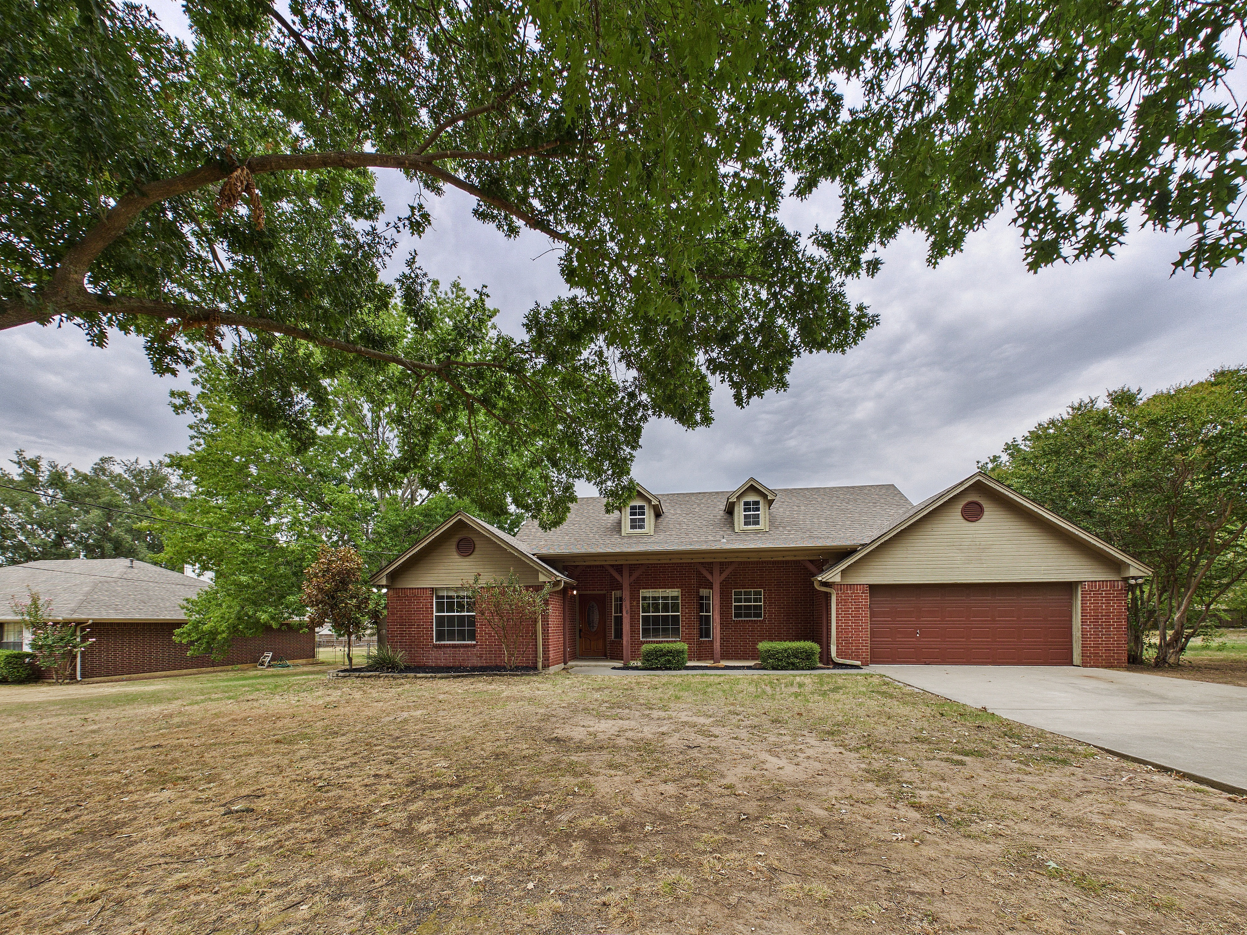 616 West Walcott Street, Pilot Point, Texas 76258 by day
