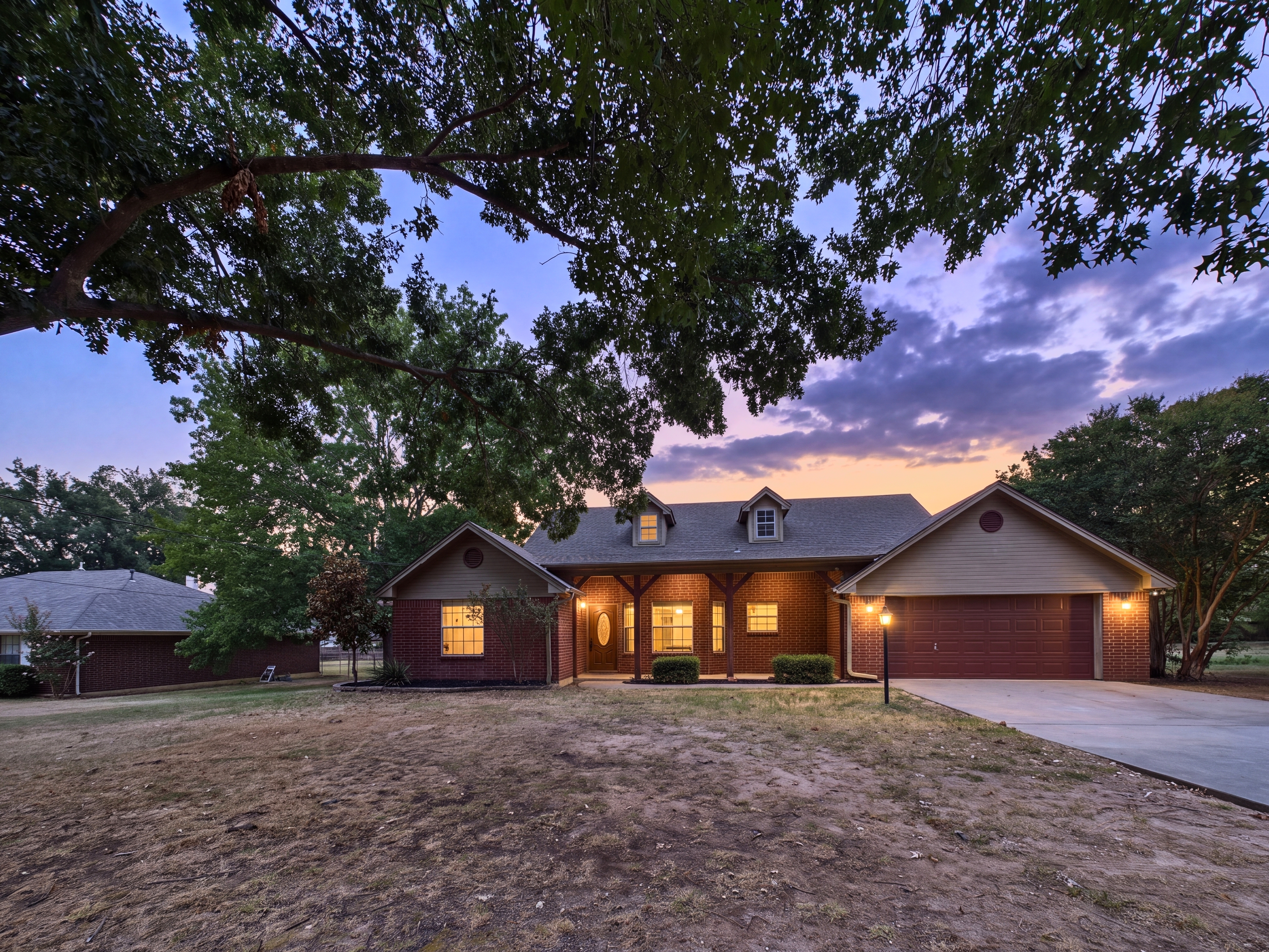 616 West Walcott Street, Pilot Point, Texas 76258 at twilight